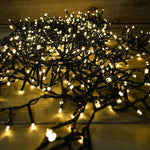 Premier Decorations 1000 Battery Operated LED Treebrights Timelights, 100m Multi-Action String Christmas Lights – Indoor/Outdoor, Timer Function – Available in White, Blue, Multi, Rainbow, Vintage Gold & Warm White (Green Cable)